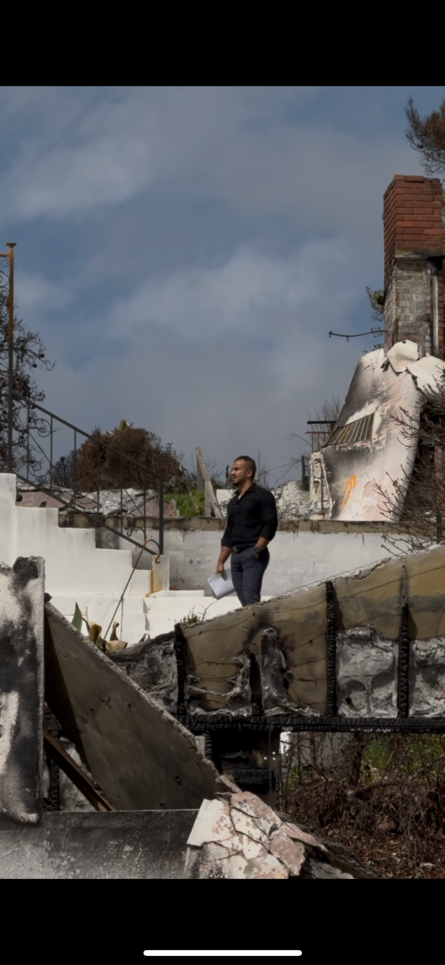ALI ON BURNED LOT · ALTADENA · WIDE SHOT